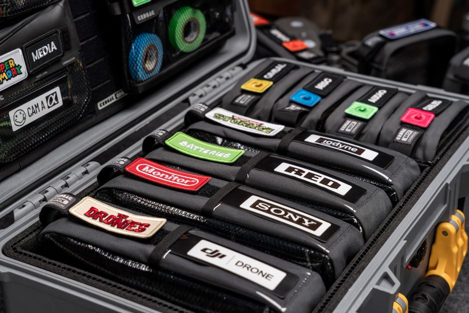 Well-organized camera and photography gear stored in a protective hardcase.